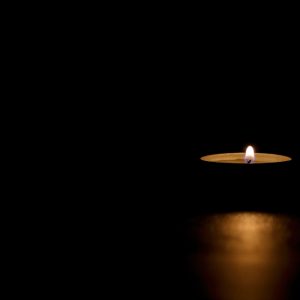 lit-tin-candle-dark-conveying-memorial-death-hope-darkness